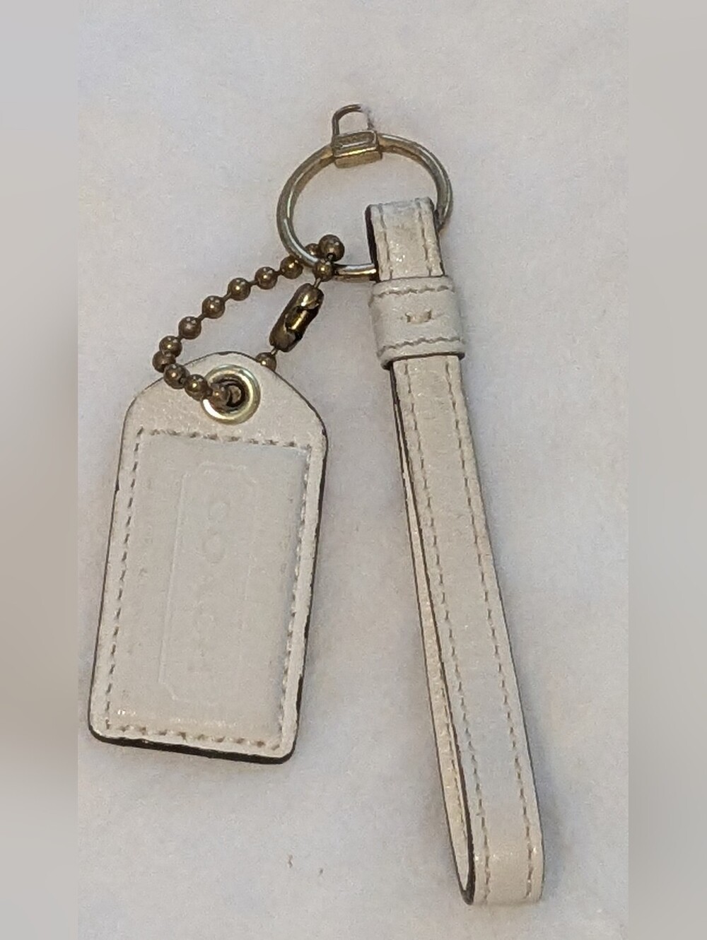 Coach ivory patent leather nickel fob bag charm keychain hang tag